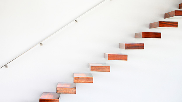 A building with red balconies